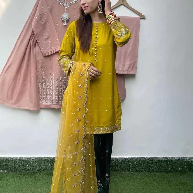 Grace with our beautifully crafted Raw Silk Farshi Suits with net duppta perfect for festive wear, parties, or elegant everyday style