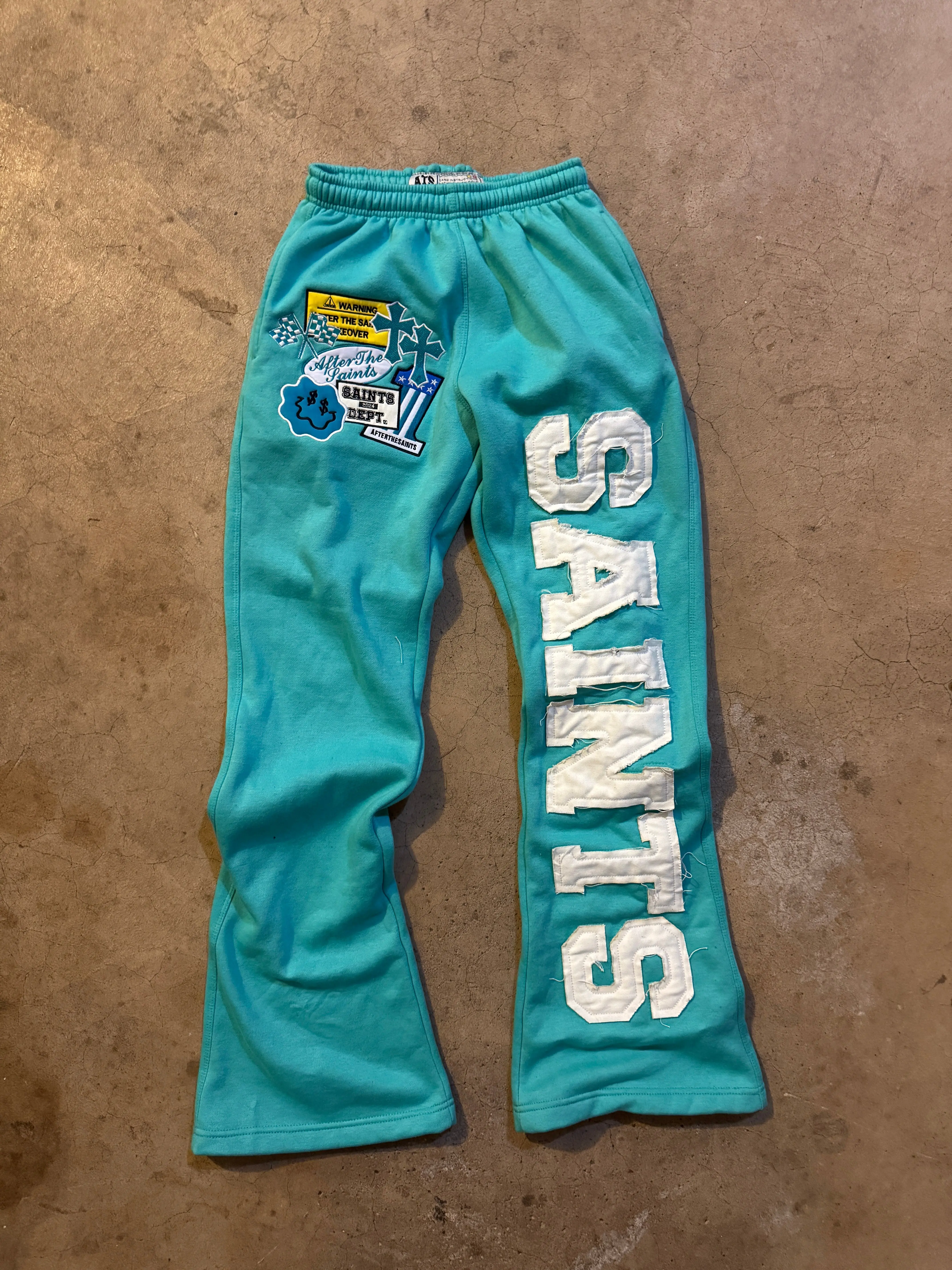 PATCHWORK TURQUOISE SWEATS