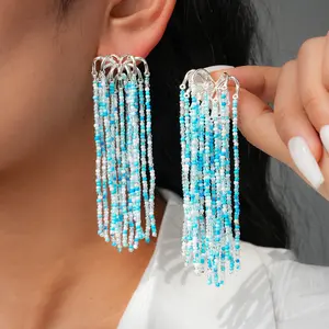 A pair of fireworks glass beads, fringed silver needle stud earrings, simple and fashionable temperament earrings
