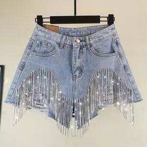 Women’s shorts with ripped holes and tassel chain — sexy women’s bottoms for festive outfits