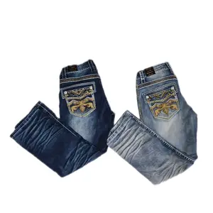 Premium Gold Line Pantalones Vaqueros con Diseño de Bolsillo y Detalles Dorados