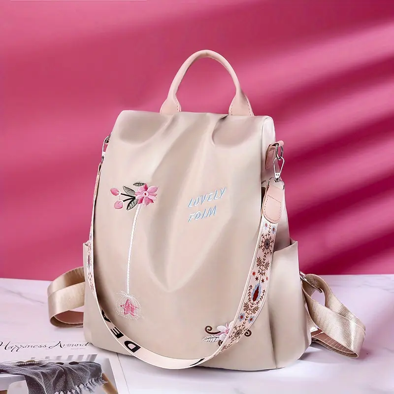 Women's Stylish Floral Embroidered Nylon Backpack - Anti-Theft Travel Daypack with Zip Closure, Utility Pockets, Beige Design with Pink & Blue Flowers, Daypack Backpack Design, Hand Wash Only, Durable Nylon, Casual