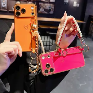Plated Hollow Love Heart Wrist Strap Kickstand Phone Case with Lanyard for iPhone 17 Pro Max 16 15 13 Pro, Soft Silicone Cover
