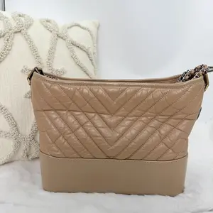 Pre-owned CHANEL Gabrielle Hobo bag in aged calfskin leather with a chevron pattern