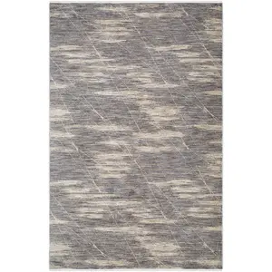 Utari Taupe Area Rug