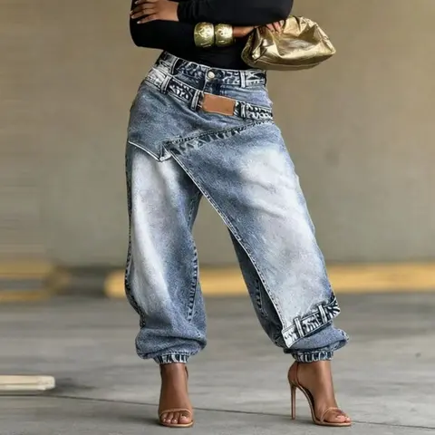 Women's long wide-leg jeans with a distressed washed look, irregular layered panels, waistband featuring leather tag detailing, non-stretch fabric.