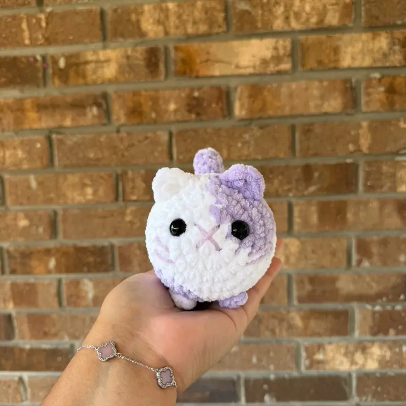 Handmade crochet purple spot cat plushie