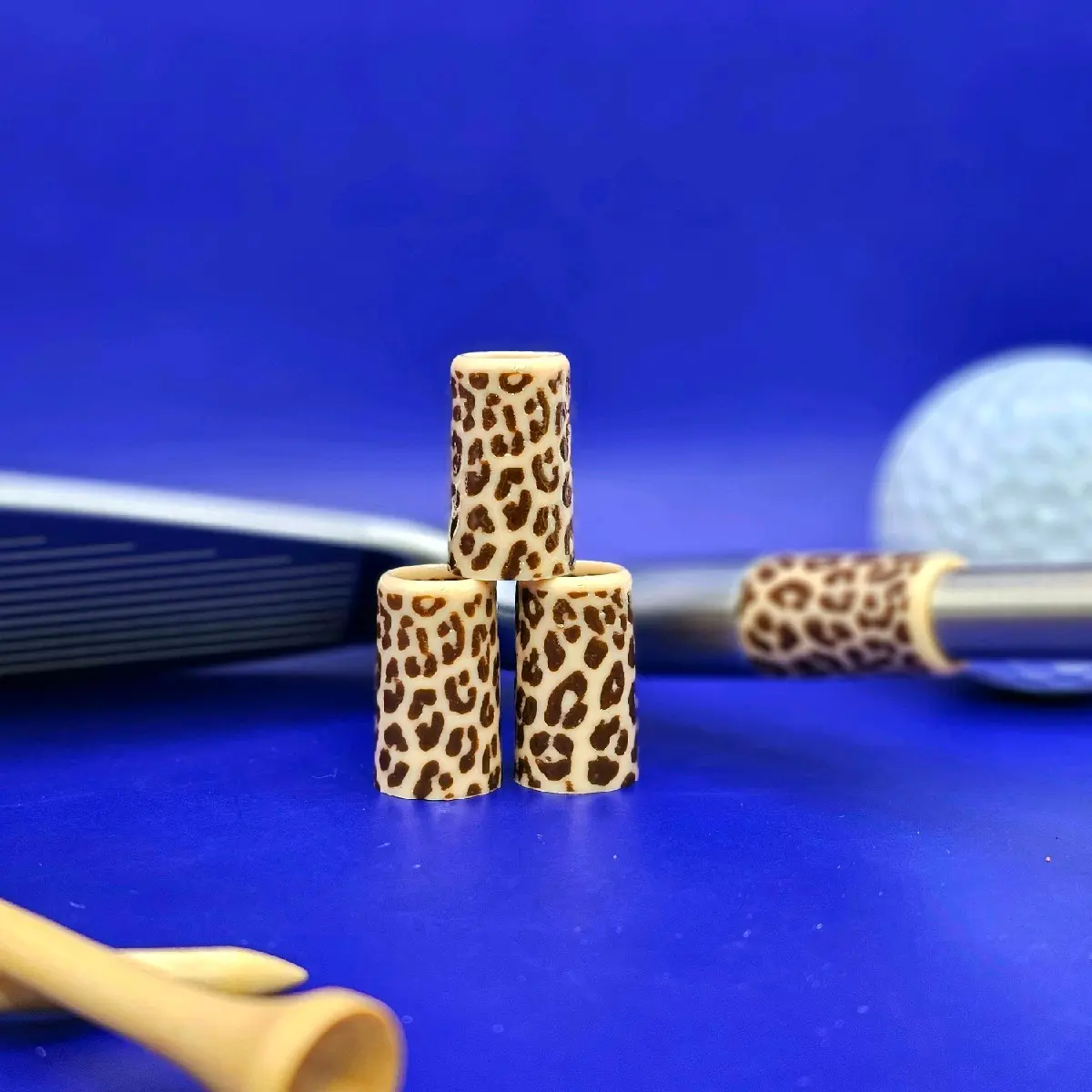 Leopard print golf ferrules.