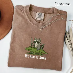 Comfort Colors Raccoon and Alligator TShirt, We Ride at Dawn T-Shirt, Funny Whimsical TShirt, Humor Animal Gift, Cottagecore Aesthetic Shirt