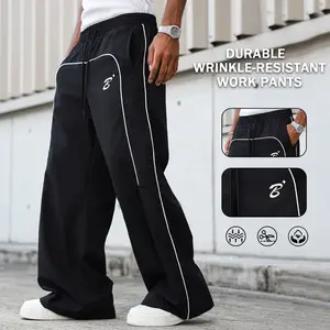 Men’s wide-leg athletic pants — black nylon streetwear long pants with white-edge contrast stripe design, elastic waistband with drawstring; casual pants featuring a printed logo; lightweight, wear-resistant; suitable for everyday/sports/streetwear; Y2K s