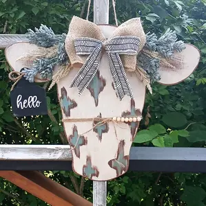 Handpainted Aztec cow head Door Hanger