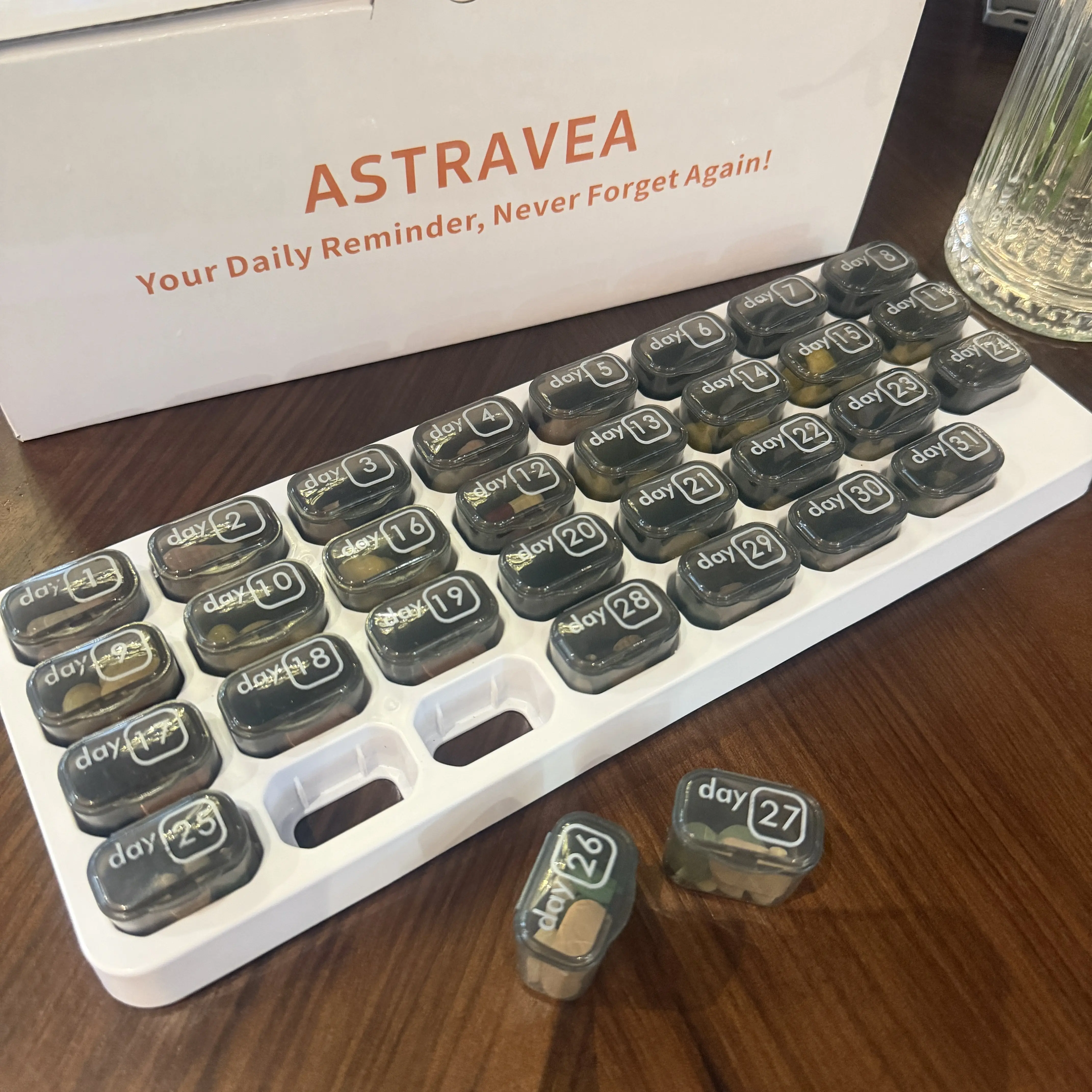 ASTRAVEA Monthly Pill Organizer - 31 Day Pill Organizer with  Removable Medication Pods, Portable Pill Case Box and Holder for Daily Medicine and Vitamins, Great for Travel