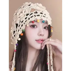 Women's Hollow Knit Beanie decorated with colorful beads, flowers and tassels. Bohemian ethnic style, handmade crochet design, stylish and all-match daily headwear.