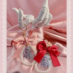Kawaii Berserk Inspired Handmade Griffith Gothic Lolita EGL Gyaru Coquette Y2K Fashion Bag Charm Keychain with Bow and Pearl Design