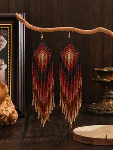 A pair of women's fashionable beaded earrings with a retro style, deep red earth tone geometric brick joint pattern, long tassels hanging down the shoulders, suitable for women to wear at daily banquets, versatile, Boho Style Jewelry