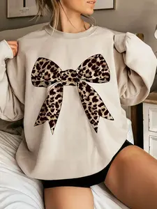 Trendy Crew Neck Coquette Aesthetic Pullover, Casual Loose Fit Fashion Sweatshirt for Women, Soft Comfortable Fall/Winter Top, Beige Sweatshirt with Leopard Print Bow Graphic, Women's Casual Leopard Print Bow Sweatshirt For Autumn Graduation,Back To Schoo