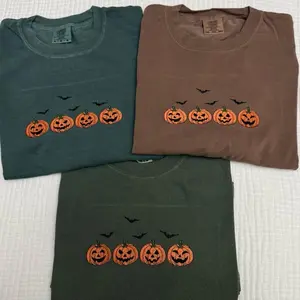 Embroidered Halloween pumpkins with bats  comfort colors T-shirt
