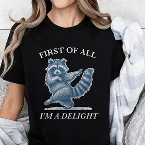Viral 2026 Funny Raccoon Graphic Tee – First Of All I’m A Delight Retro Vintage Streetwear Oversized T-Shirt for Men Women Sarcasm Humor Animal Lover ✨