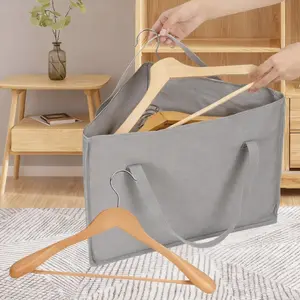 1pcs hanger storage bag, triangular design, non-woven fabric material, with a support pad at the bottom, sturdy and durable, can store various sizes of hangers, suitable for home wardrobe storage, drying rack hanger storage, and household item storage