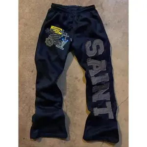 Viral Gothic religious-pattern sports pants — oversized, soft cotton-blend sweatpants, a must-have for avant-garde casual wear and streetwear aesthetics, featuring a letter patch. GARMENTARY