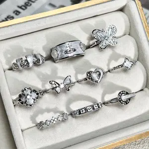 Fashionable vintage-style sweet and cool white enamel butterfly and Saturn fashion ring for women, niche minimalist geometric personalized ring gift