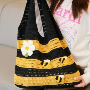 Women's Tote Bag — A charming, hand-crocheted bag adorned with cute bees and daisies; featuring a vintage-style, open-knit design with striking black and yellow contrasting stripes, making it a versatile and stylish accessory for summer street fashion.