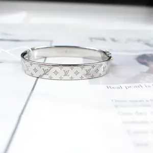 Pre-owned Louis Vuitton Silver Monogram Metal Cuff Bracelet T10337633