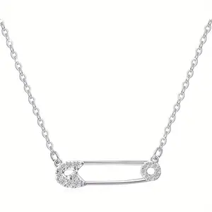 A Stylish Necklace Collar for Women Featuring Safety Pins niki safety pin necklace