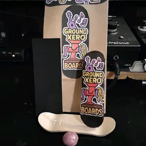 Ground Xero Maple Press 30-32 mm Fingerboard Deck with Unique Design and Branding