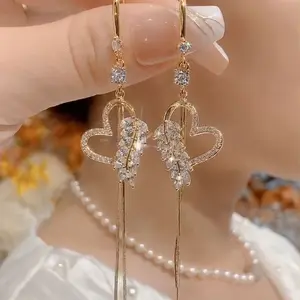 Luxurious diamond-studded long heart-shaped tassel earrings, unique design, versatile and stylish, new 2026 earrings