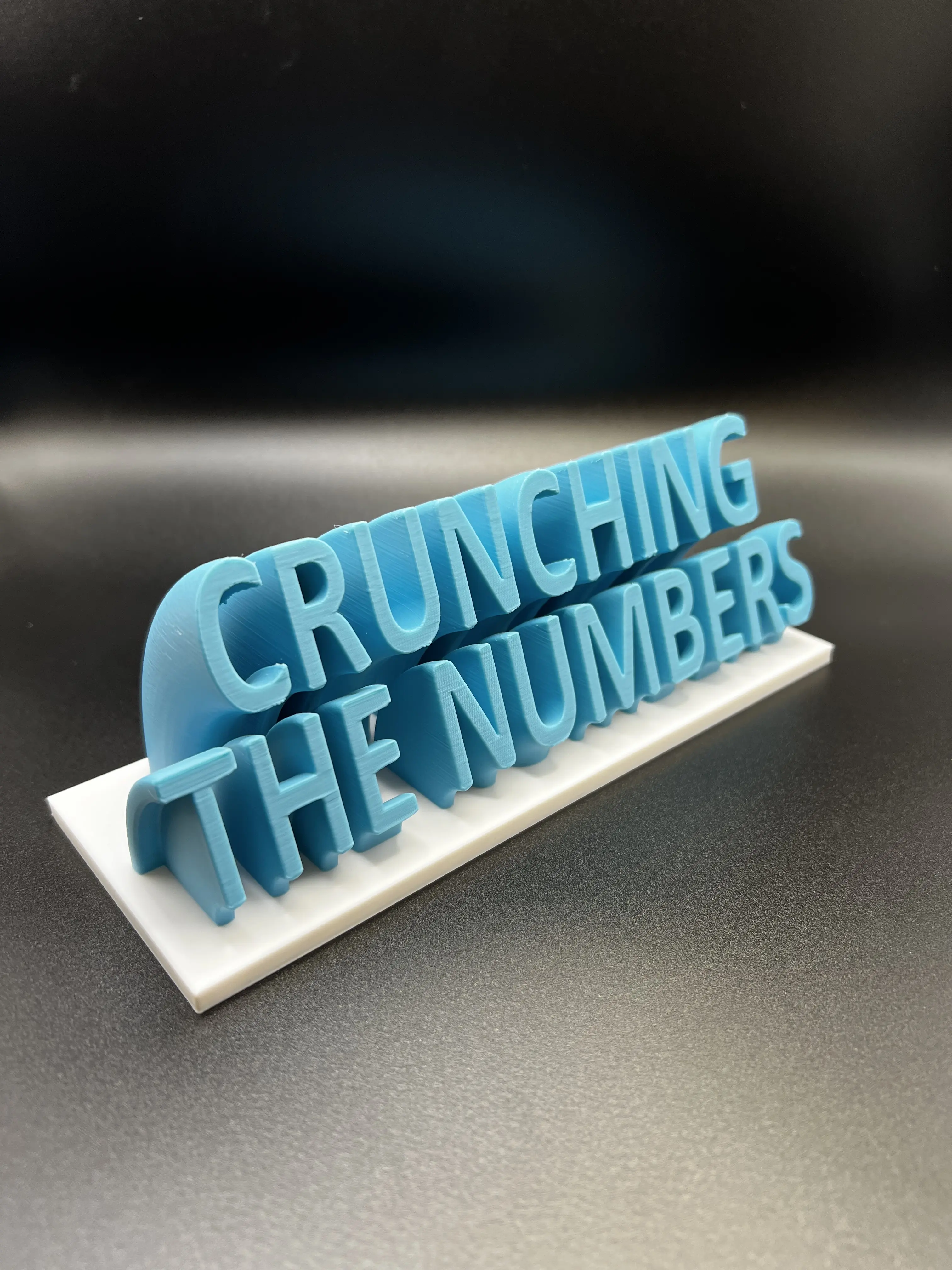Crunching The Numbers Desk Sign - Blue and White or Black and Gold Word Art Decor for Your Workspace