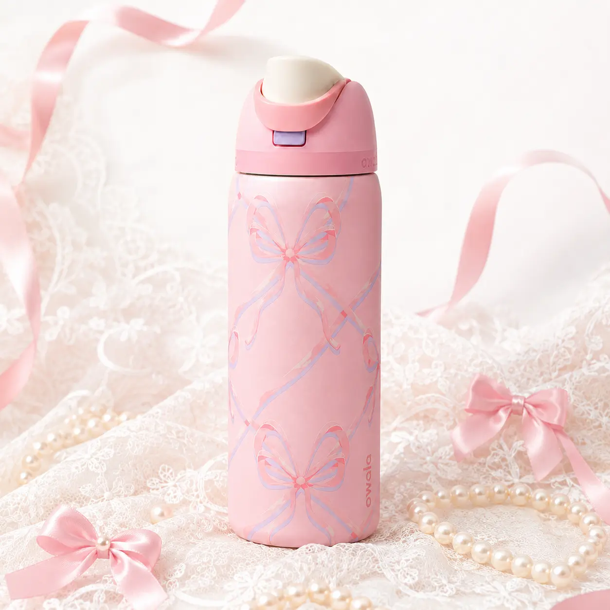 Owala FreeSip Pink Bow Insulated Stainless Steel Water Bottle with Built-In Straw and Carry Loop