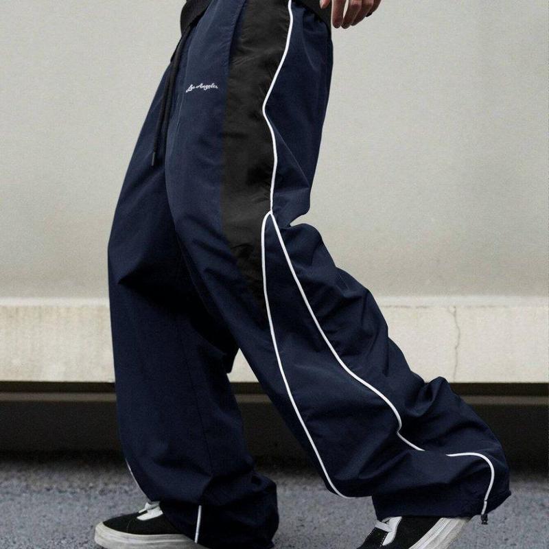 Men's Black Colorblock Sweatpants with White Side Stripes & Embroidered Design for Gym Wear, Loose Athletic Long Pants, Sporty Elegance, Drawstring Waist, Straight Leg Cut, Trendy Street Fashion Joggers Sports Menswear Embroidery Embroidery Tracksuit