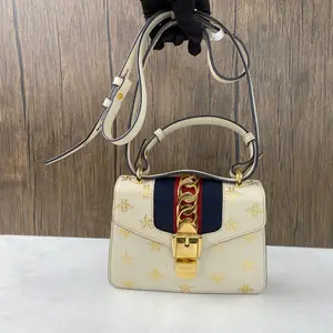 Pre-owned GUCCI Pebbled calfskin leather Crossbody Bags Sylvie mini bag in white leather with bee & star print..QG1543