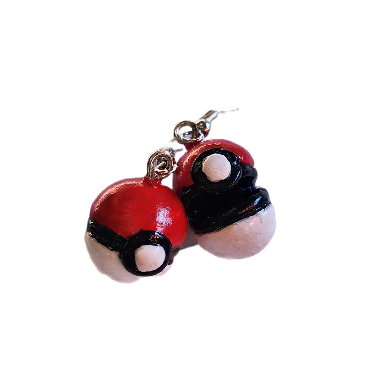 Hand sculpted Pokémon ball earrings. made from polymer clay.