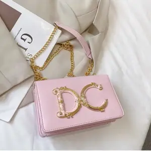 Pink Crossbody Bag with Gold Chain Strap and Embossed Logo for Women's Fashion
