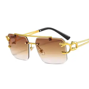Sun Glasses - Gold Frame with Unique Design Elements and Brown Tinted Lenses