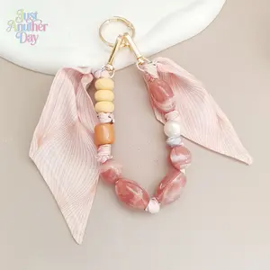 Elegant Scarf Tassel Beaded Keychain Pink Marble and Pearl Design Versatile Wrist Strap for Phones and Bags Great for Coquette and Cottagecore Lovers