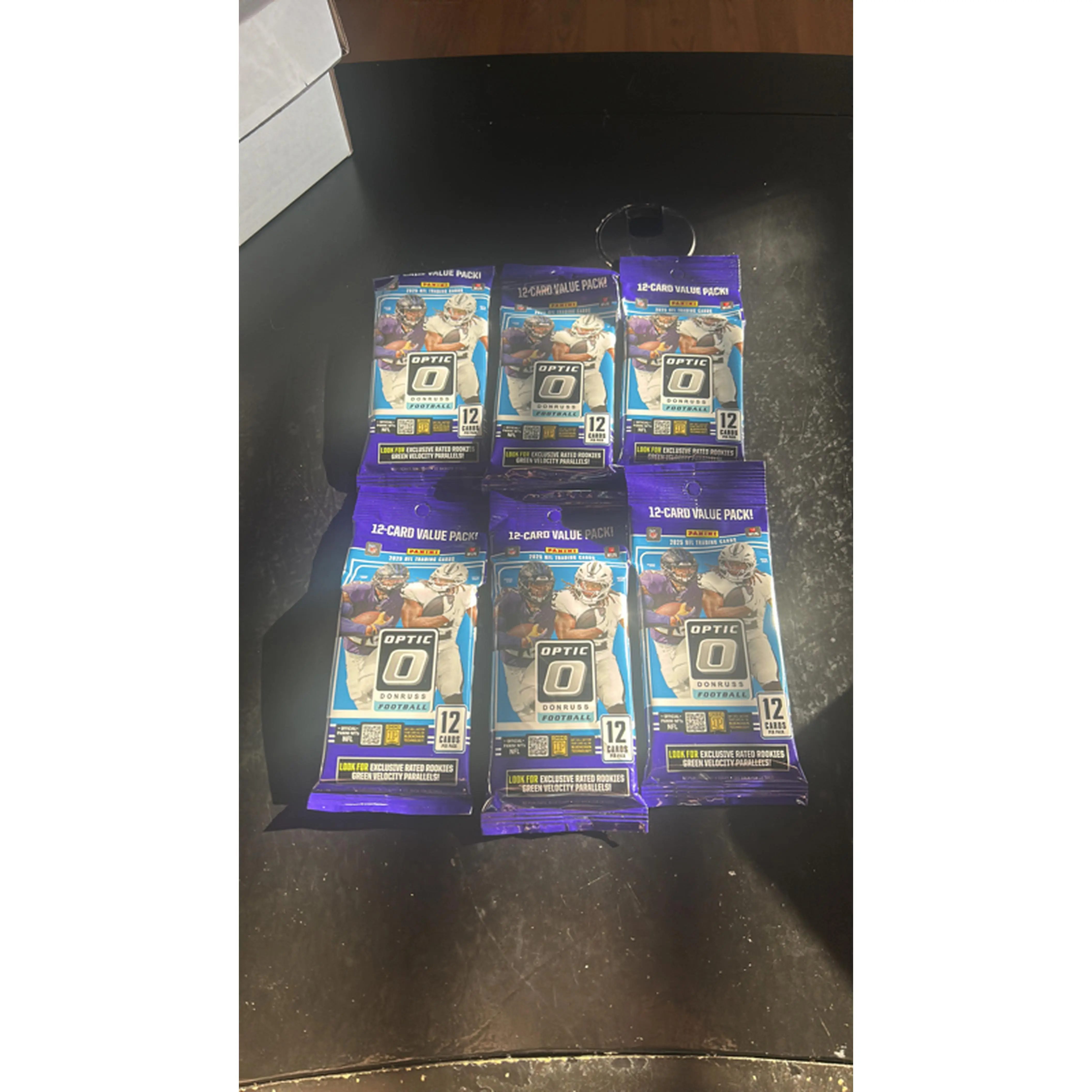 2025 NFL optic value packs. This is a lot of 6 total packs. 72 cards total