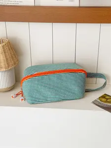 Large capacity multi-purpose toiletry bag for women and boys, orange zipper cosmetic storage bag with wrist strap, suitable for daily use, travel and fitness