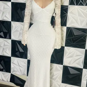 Elegant White Lace Long Sleeve Mermaid Dress with V-Neckline and Sheer Sleeves for Special Occasions