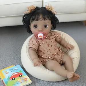 Peeka Adorable 16 Inch Reborn Baby Doll with Brown Skin Curly Hair Big Eyes Soft Cloth Body Hug Friendly Ideal for Toddlers Birthday Gift - Rebornbabydoll