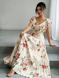 A women's apricot colored fashionable Floral rose print pleated long dress, with a gentle print and a flowing pleated skirt suitable for commuting to work, shopping and outdoor activities, indoor and outdoor dressing