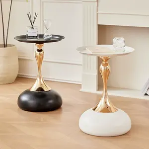 Fashionable classic tulip side table, A few tea tables next to the sofa in the living room