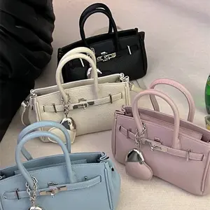 Small high-end lychee pattern hand-held platinum Kelly bag female 2025 new fashion shoulder bag versatile crossbody bag