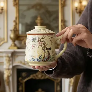 This ceramic mug, featuring a lid and an internal filter, is perfect for drinking water, coffee, tea, and milk. It's ideal for daily use at home, in the office, or for serving guests, and makes a great Floral Gift Mug for the holidays.