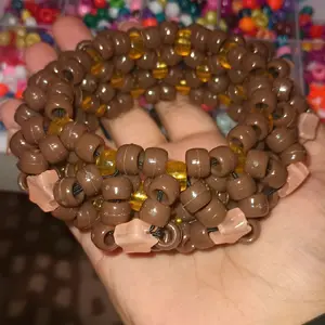 brown and orange one x base cuff