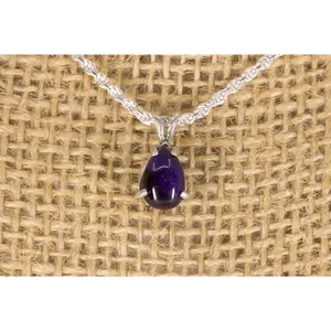 Sugilite Teardrop Pendant Prong Set In Sterling Silver