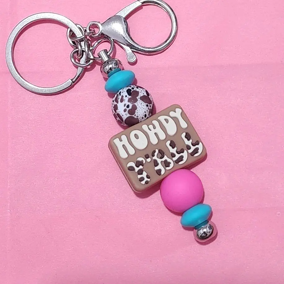 cow print howdy yall keychain