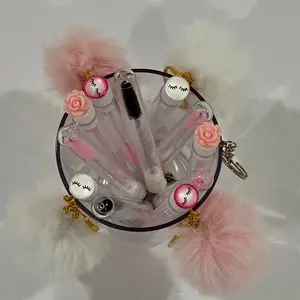 Evolutionary Keychain & Mascara Wands Set with Pink Pom-Poms and Black and White Accessories